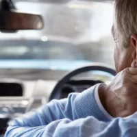 bigstock-Driver-Suffering-From-Whiplash-47469532.jpg