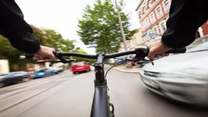 Black Bicycle Driving Fast on the Road