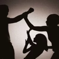 A Mother Protects Her Child from Father Violence