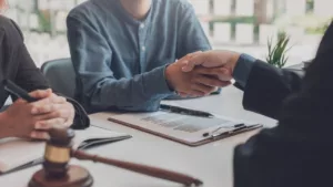 A Lawyer Provides Legal Advice to His Client in the Office