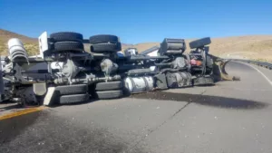 Crashed Cement Truck on Its Side on a Roadway