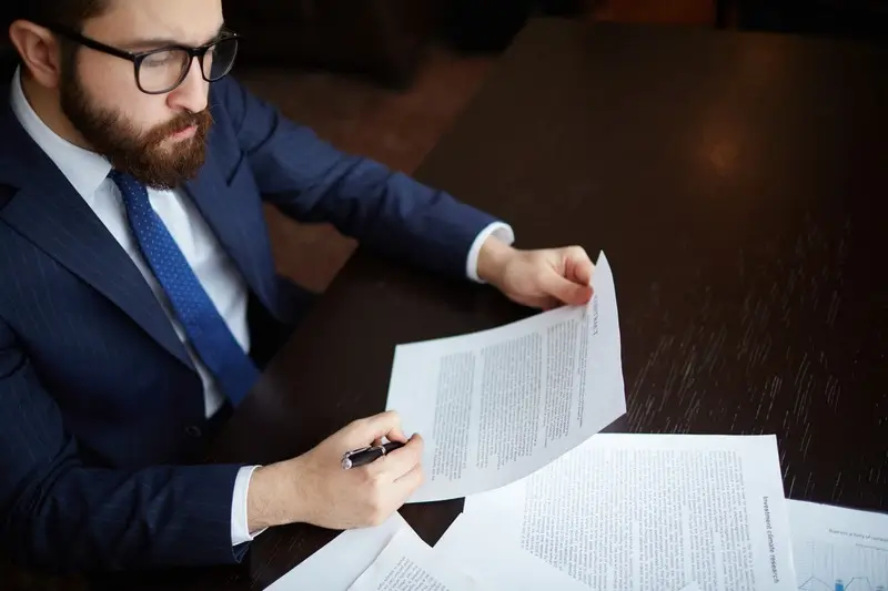 Lawyer reading client case contract